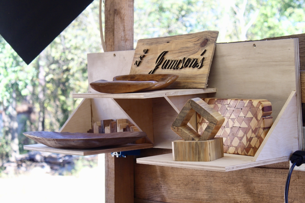 Joey Jamison creates a variety of wooded crafts utilizing trees donated to Chosen Farm and Sawmill. (Jovanna Aguilar/Community Impact)