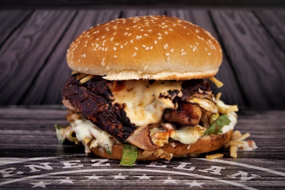 Primos Venezuelan Food serves a mix of Venezuelan street food and American fusion, including burgers, sandwiches and traditional arepas. (Courtesy Primos Venezuelan Food)