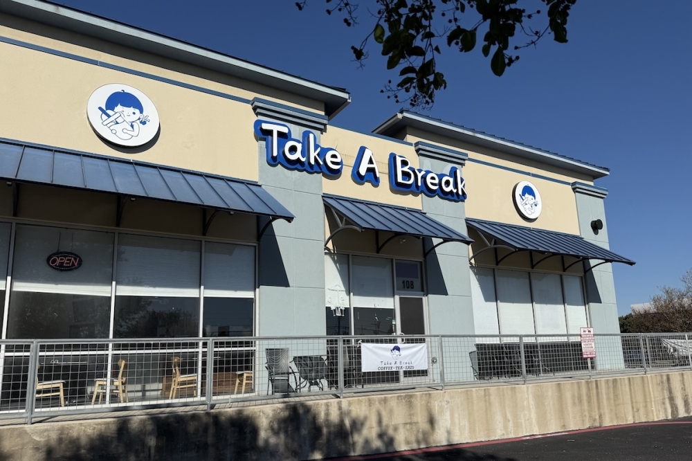 Take A Break Coffee put up new signage at its location off of Pat Booker Road in Universal City, removing all Kung Fu Tea branding. (Andrew Creelman/Community Impact)