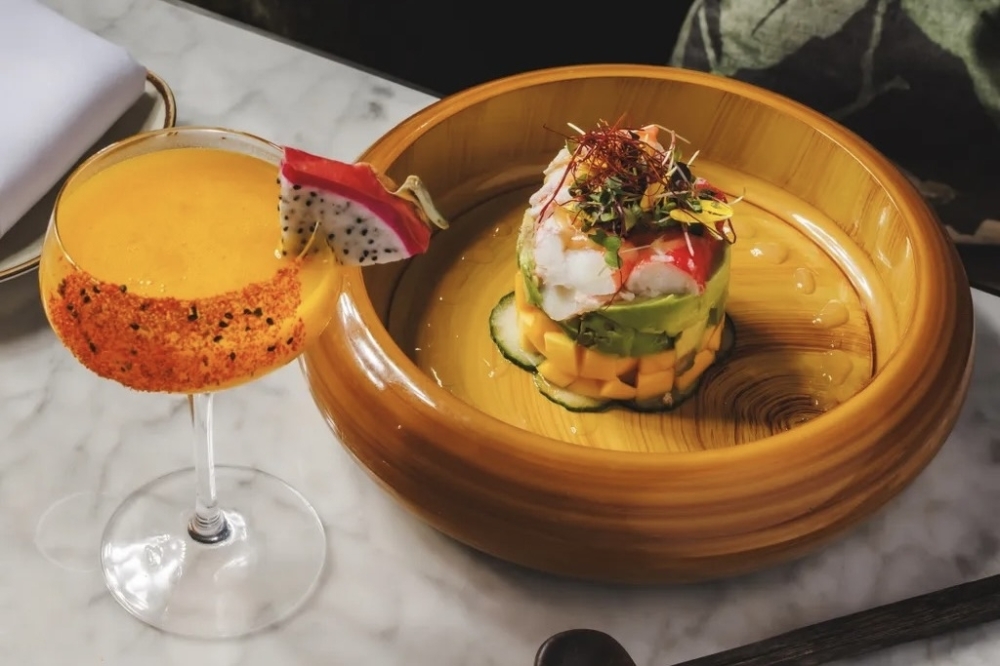 On the seafood menu, an Alaskan King Crab Salad is made with king crab, sliced avocado, fresh mango and citrus miso vinaigrette. (Courtesy Maison Chinoise via Facebook)