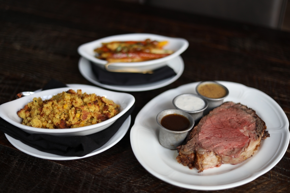 Dean's Italian Steakhouse will offer a special holiday experience with prime rib, roasted heirloom baby carrots and Wagyu brioche stuffing. (Courtesy Dean's Italian Steakhouse)