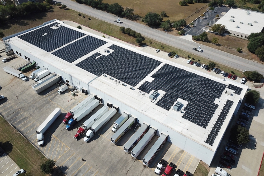 Hundreds of rooftop solar panels were installed on buildings at the Tuscany Crossing property under Austin Energy's Solar Standard Offer program. (Courtesy Austin Energy)
