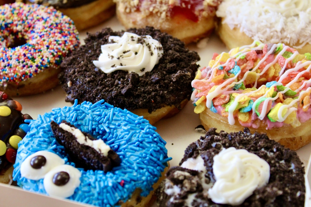 Robin’s Snowflake Donuts & Cafe's doughnut designs are crafted by Robins's daughter, Kaylah Nou. (Jovanna Aguilar/Community Impact)