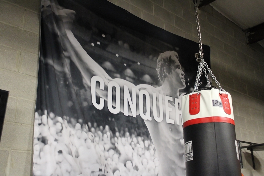 The gym contains a boxing ring, punching bags, free weights and more, all designed specifically for boxing athletes. (Andrew Creelman/Community Impact)