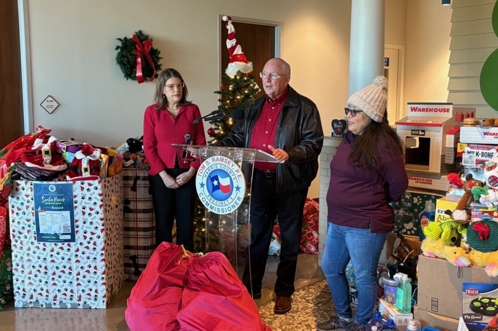 Harris County Precinct 3 Commissioner Tom Ramsey, center, discusses the shelter donation drive, flanked by Harris County Public Health Director Leah Barton, left. (Courtesy Office of Harris County Precinct 3 Commissioner Tom Ramsey)