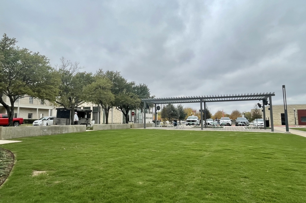 The project also brings an event lawn, food truck area and seating to a new part of downtown. (Claire Shoop/Community Impact)