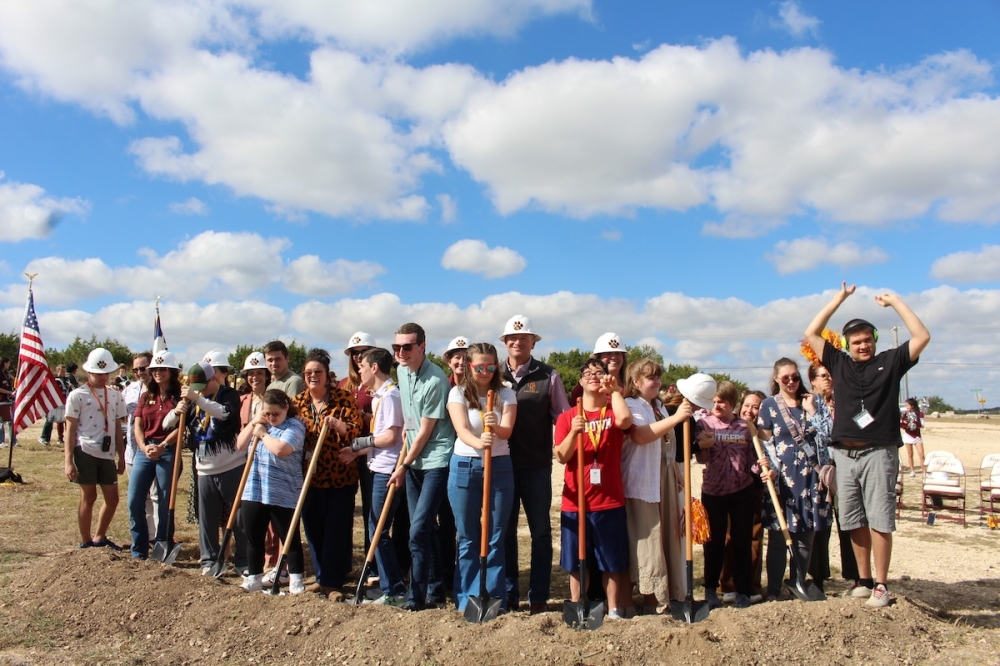 The district hosted a ceremony to celebrate the groundbreaking of the new facility alongside members of the 18+ program and the community. (Sienna Wight/Community Impact)