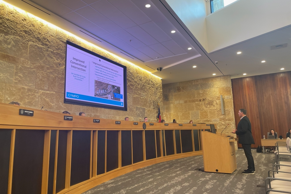 Kevin Hoffman, Tetra Teach transportation regional director, gave a presentation on design concepts for the FM 1626/RM 967 intersection at an Aug. 5 Buda City Council meeting. One of the design concepts Hoffman presented was an improved conventional intersection, which was recommended as the interim improvement. (Sienna Wight/Community Impact)