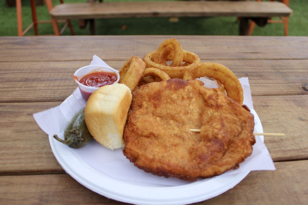 The chicken on a stick menu item was inspired by San Antonio's annual festival, Fiesta. (Dacia Garcia/Community Impact)