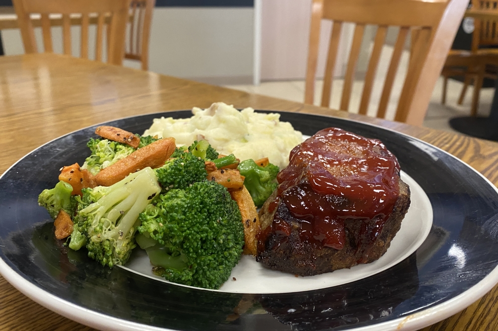 Bistro 71 serves Chipotle Honey Meatloaf as its Thursday special with a side of hatch green chile cheddar mashers and roasted vegetables. (Katlynn Fox/Community Impact)