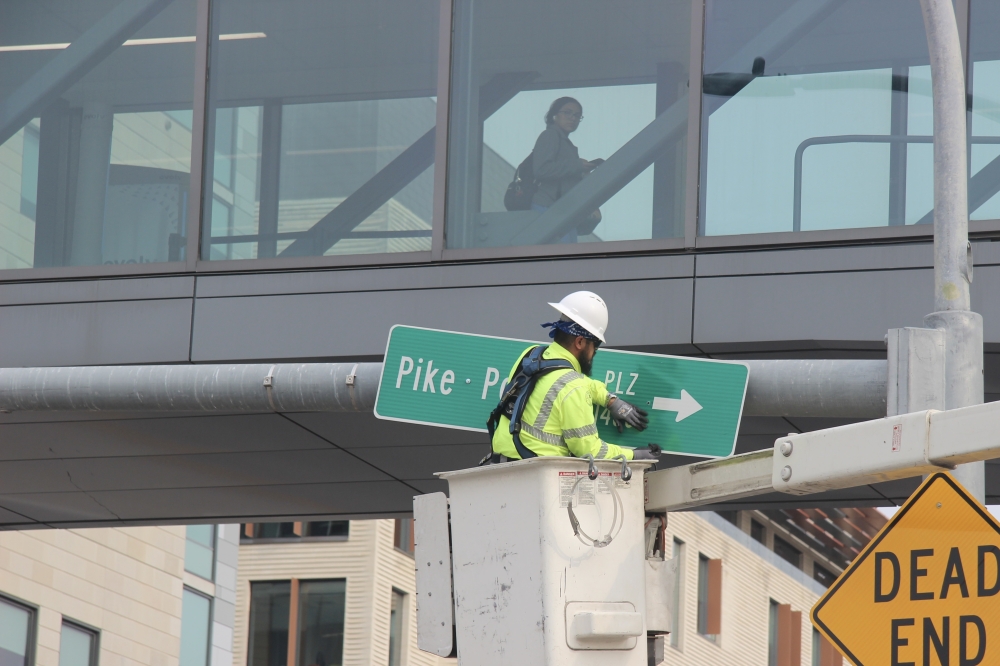 City crews formally installed signage marking the newly-dedicated Pike Powers Plaza. (Ben Thompson/Community Impact)