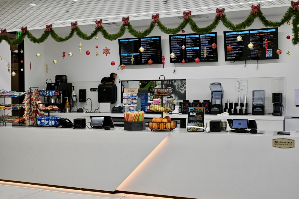 The cafe's breakfast menu includes avocado toast, protein waffles, pancakes and breakfast tacos. (Roo Moody/Community Impact)