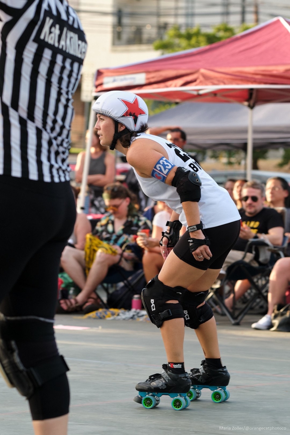In a match, one player from each team wears a star helmet which makes their position as the jammer known. (Courtesy Texas Rollergirls/Photo by Maria Zoller)