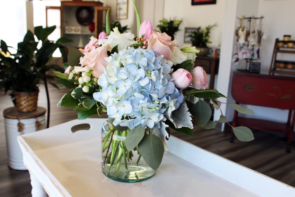 Customers can purchase fresh, pre-made flower arrangements from the cooler. (Karen Chaney/Community Impact)