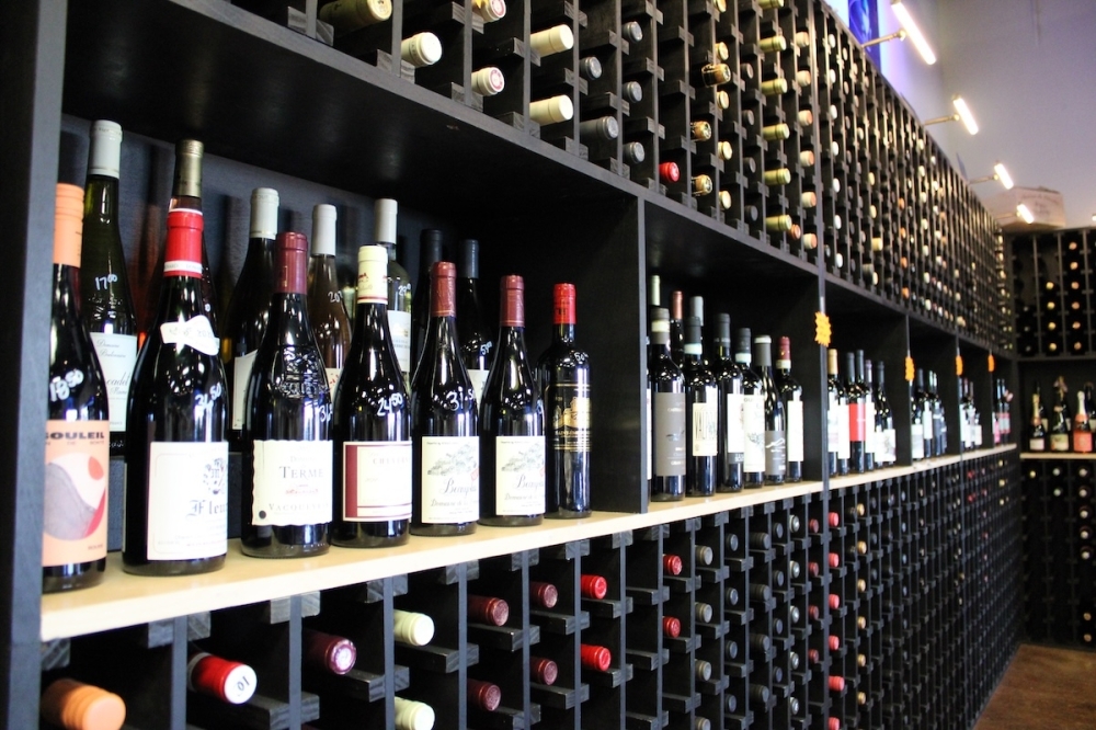 The shop's new, larger location now offers room for a large wine selection, tables for events and classes, plus more retail space. (Andrew Creelman/Community Impact)